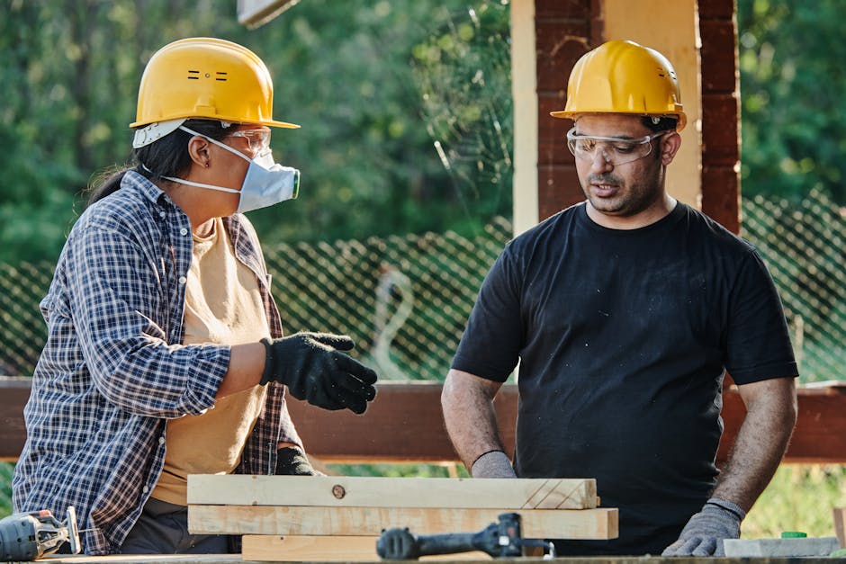 Professional construction team workers on roofing project